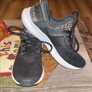 New Balance Black and Animal Print Sneakers